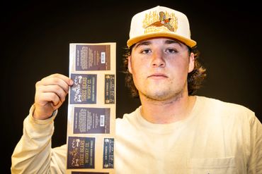 cofounder, matt, with the labels in hand