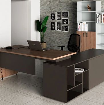 Modern office setup with sleek wooden desk, black chair, and organized shelves.