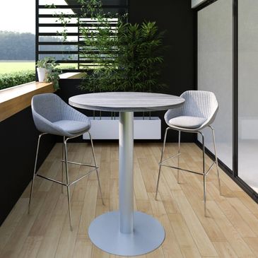 Modern balcony setup with a round table and two gray high chairs.