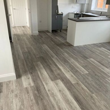 Modern kitchen. Parquet floor and wooden beams
