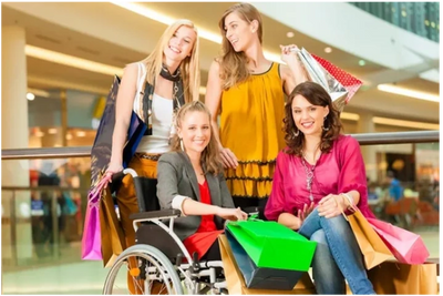 Disabled woman shopping with friends