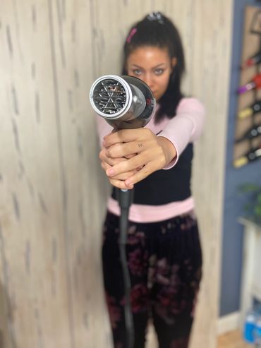 Cute pose with blow dryer