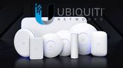 Various Ubiquiti Networks wireless devices displayed on a black surface.