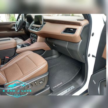 Clean and detailed brown leather interior of a Chevrolet vehicle with modern dashboard and controls.