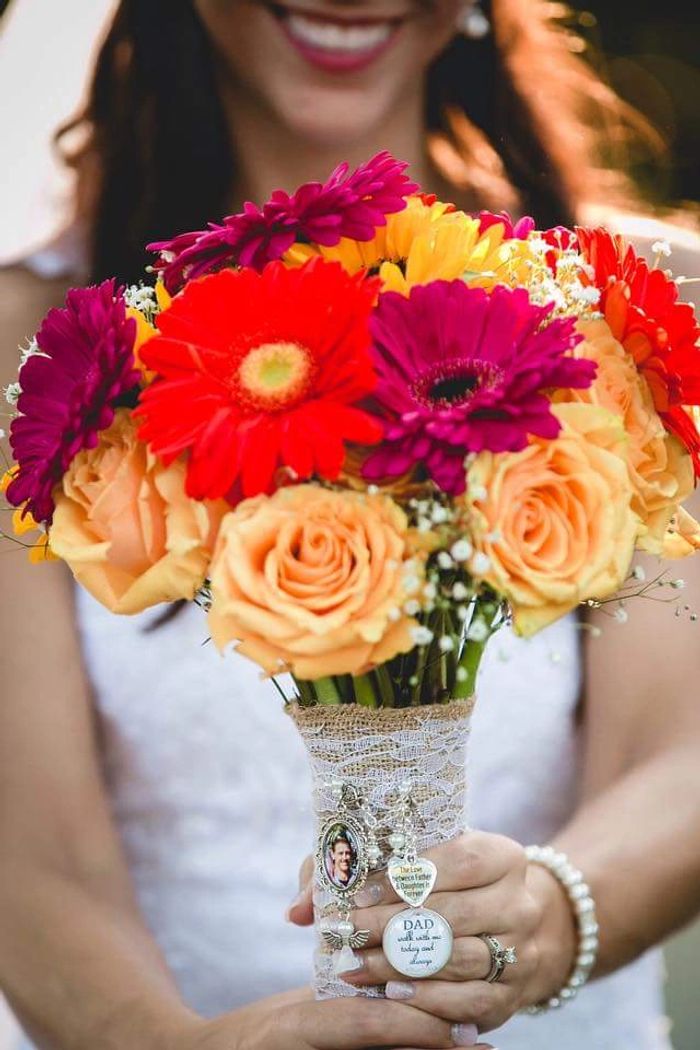 Summer wedding flower bouquet of Gerbera Daisies, Roses and Sunflowers