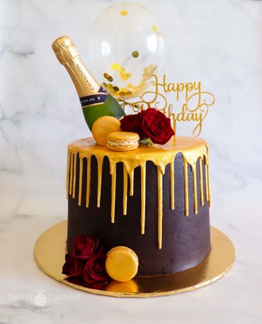 Glamorous Burgundy Birthday Cake with a Gold Chocolate Drip