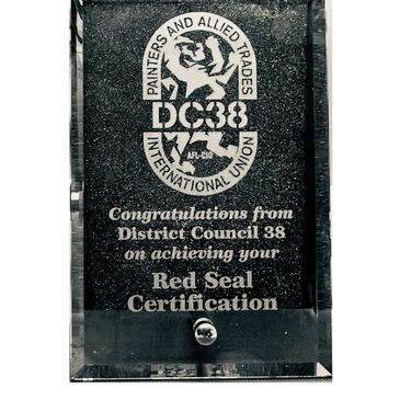 Award plaque congratulating Red Seal Certification achievers from District Council 38.