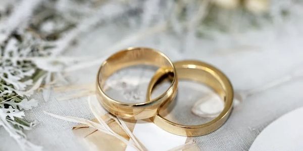 Two wedding rings on a table