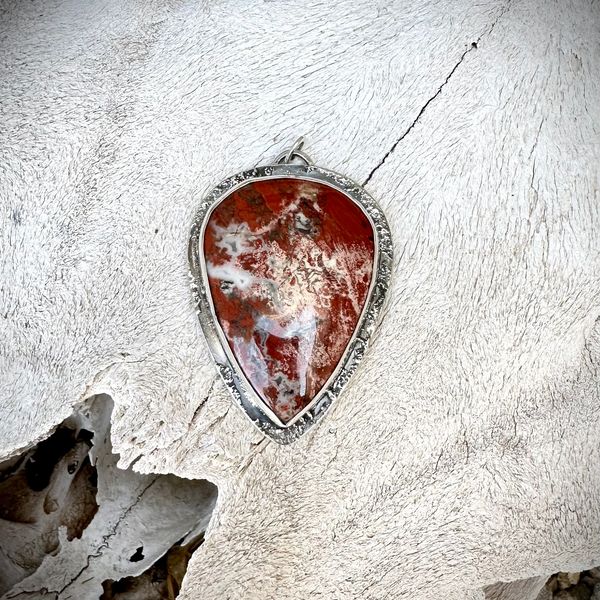 A large pendant set in sterling silver with a brecciated Jasper stone.