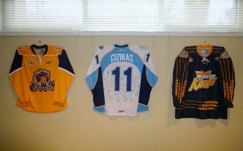 hanging sports jerseys on the wall