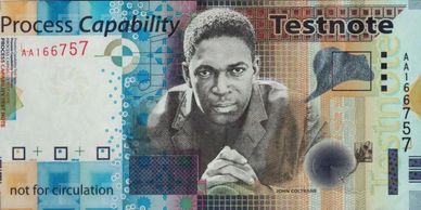 A detailed test banknote featuring John Coltrane's portrait and artistic designs.