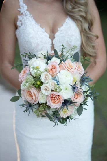 A peach and blue round bridal bouquet
 bridal flowers, wedding bouquet, wedding flowers