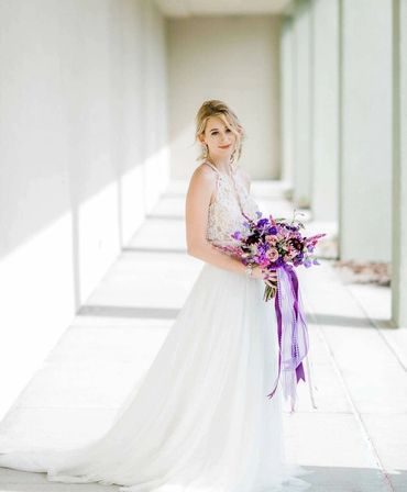 purple and lavender wedding bouquet with bride, purple bridal bouquet