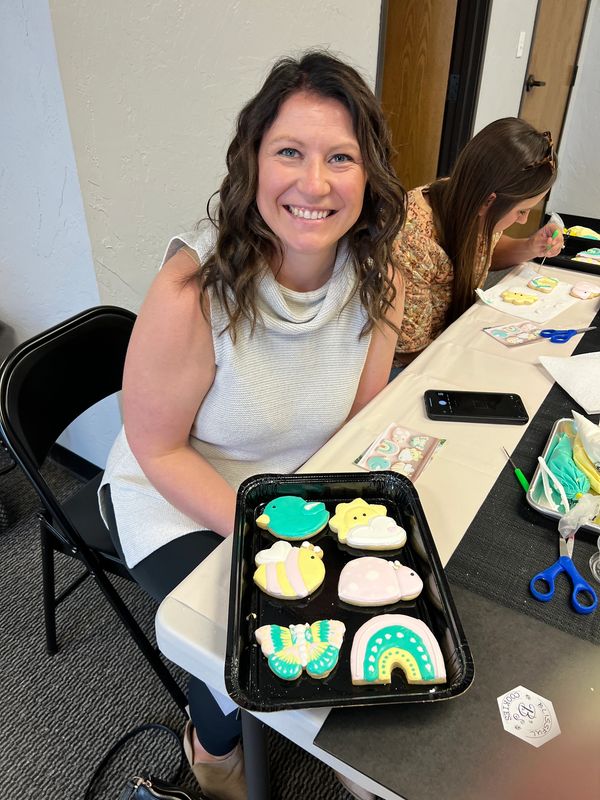 Smiling adult, sugar cookies