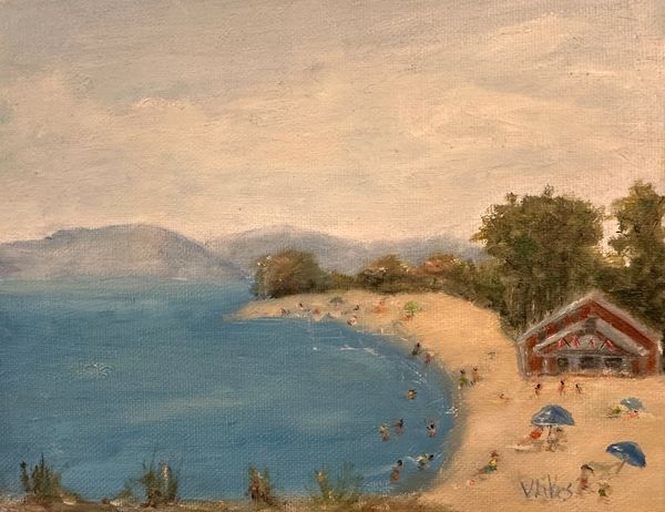 Beach scene with people and umbrellas