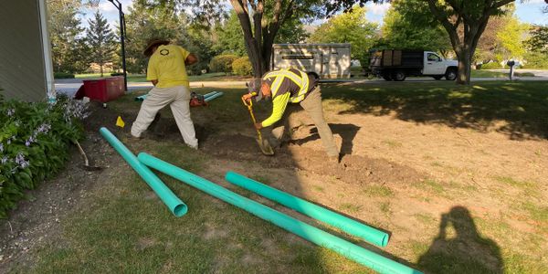 Buried downspouts and yard drainage