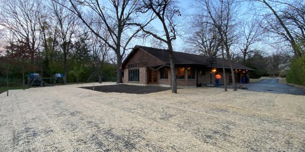 Yard grading and leveling with straw blanket and seed