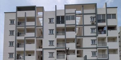 Modern residential apartment building by Viksha Projects and Myra Superior Living.