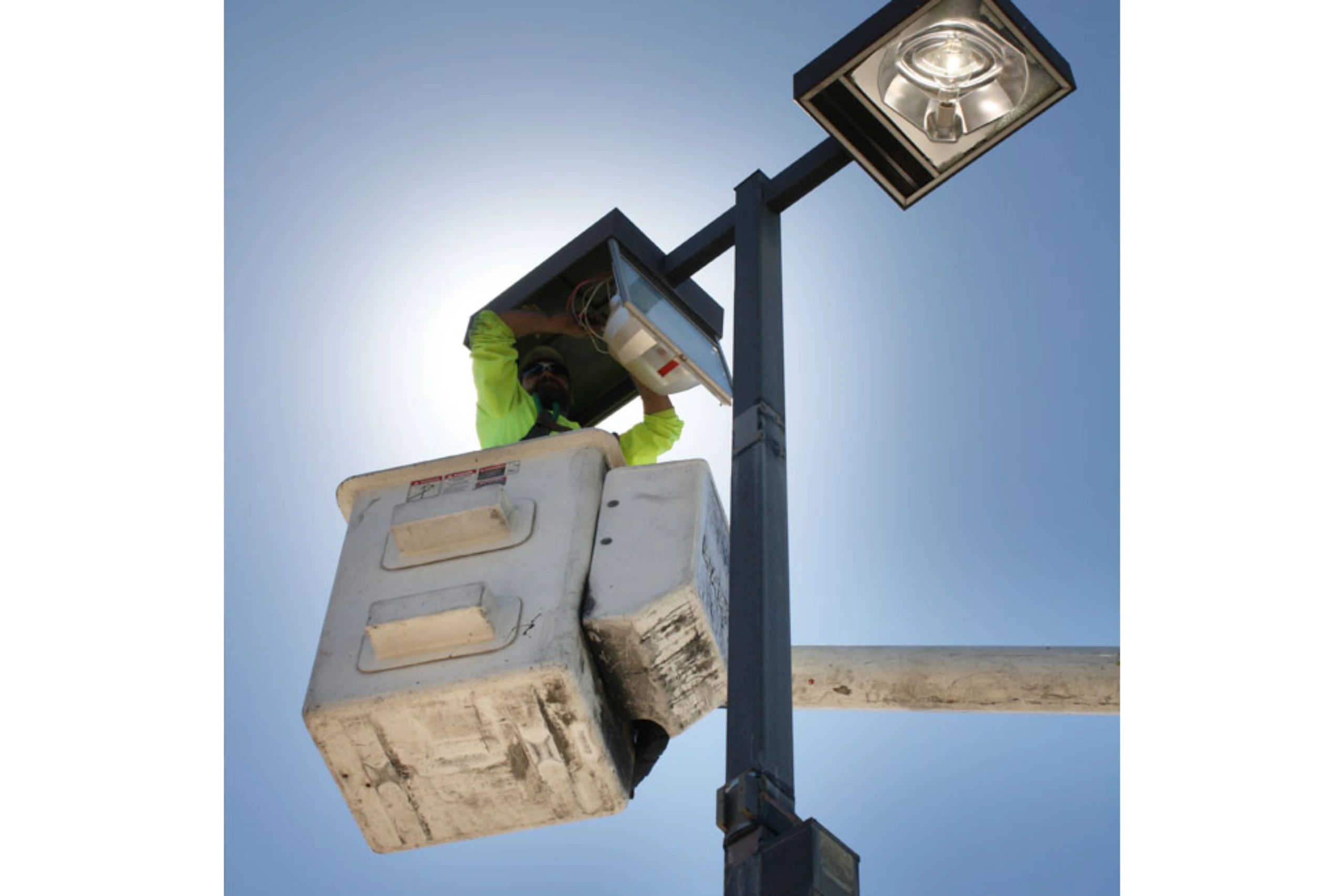 Neon sign glowing with the words 'COMING SOON' against a dark brick wall.