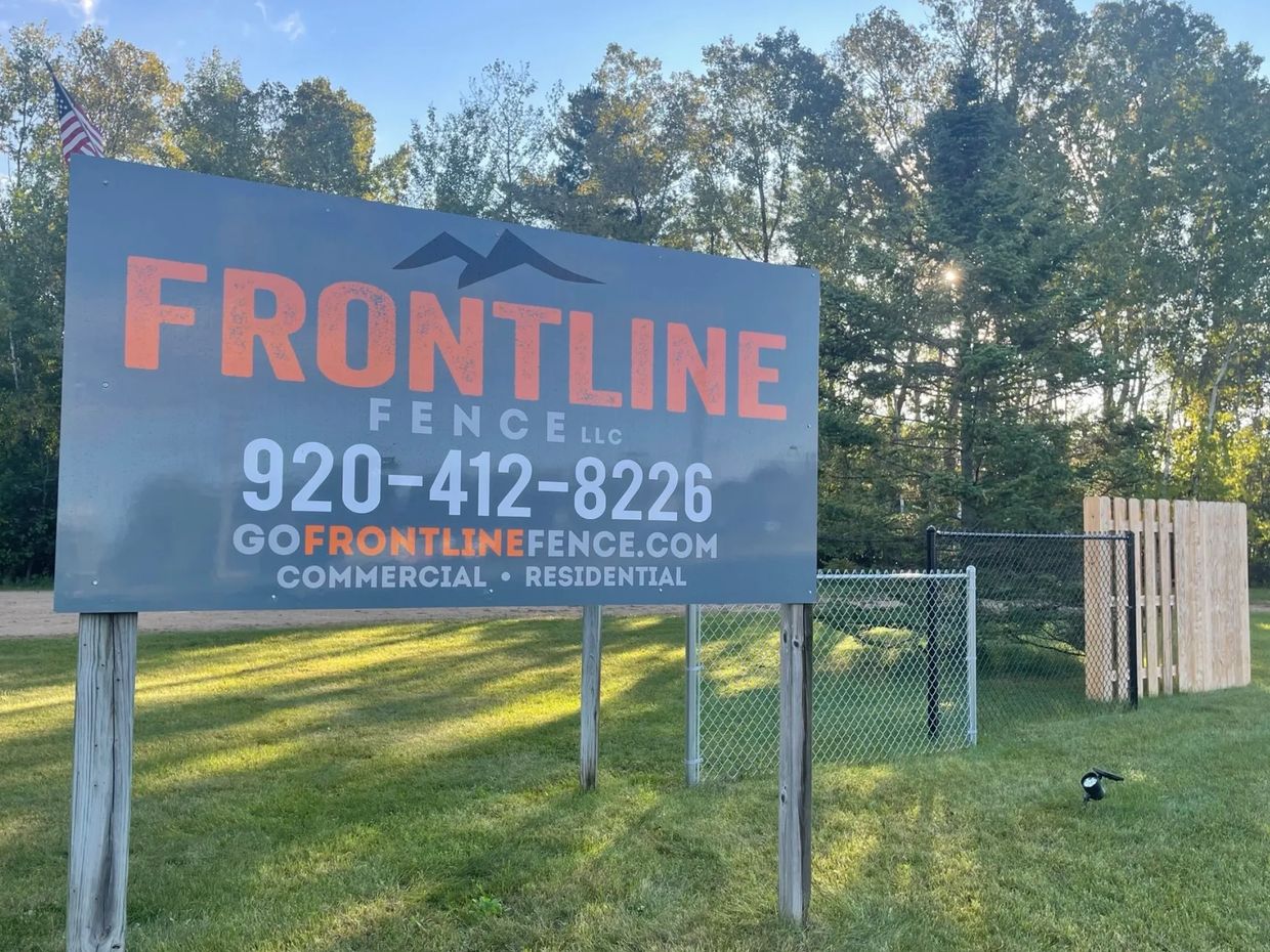Frontline Fence Sign Outside of our Shop In Shawano, Wisconsin.