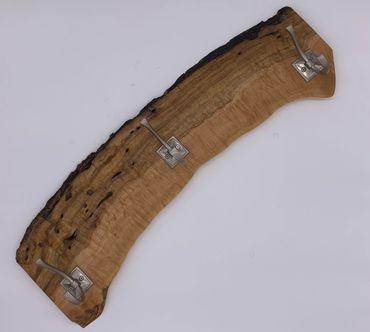 Hand made coat rack from Maple that was salvaged from the Bandon, Oregon fire that occurred in 1936