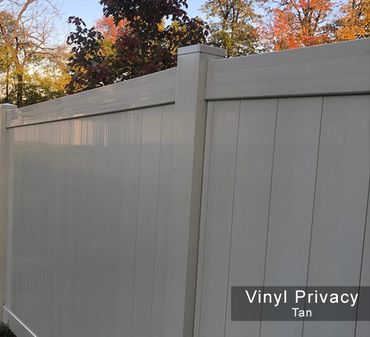 Tan full-privacy vinyl fence