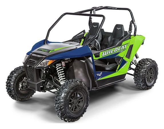 A green and blue Wildcat off-road side-by-side vehicle. Croom ATV Rentals