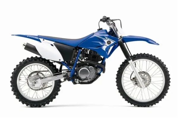 Blue off-road dirt bike with knobby tires and a sleek design. Yamaha TT-R230