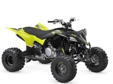Yellow and black all-terrain quad bike with off-road rentals