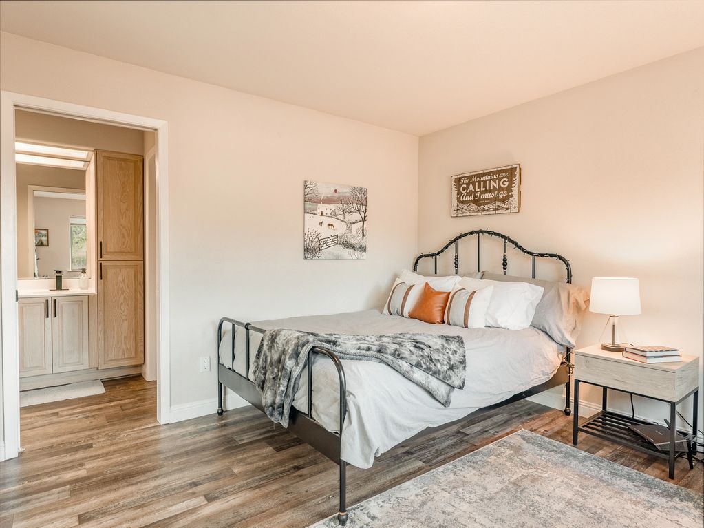Secondary bedroom has ensuite pocket door access to secondary bathroom