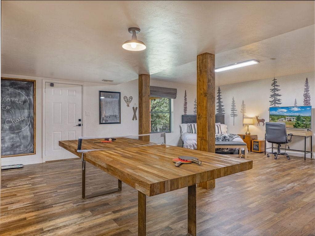New custom styled ping-pong table with 4 quality paddles and plenty of balls.