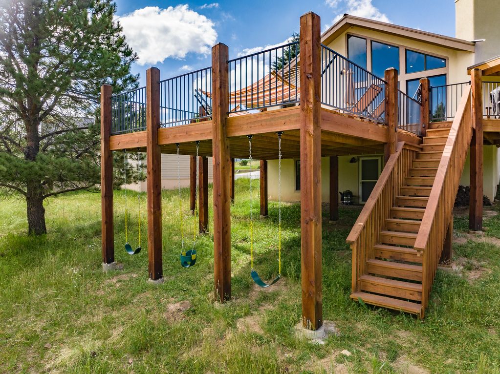 Kids can swing all day while you relax on the deck.
