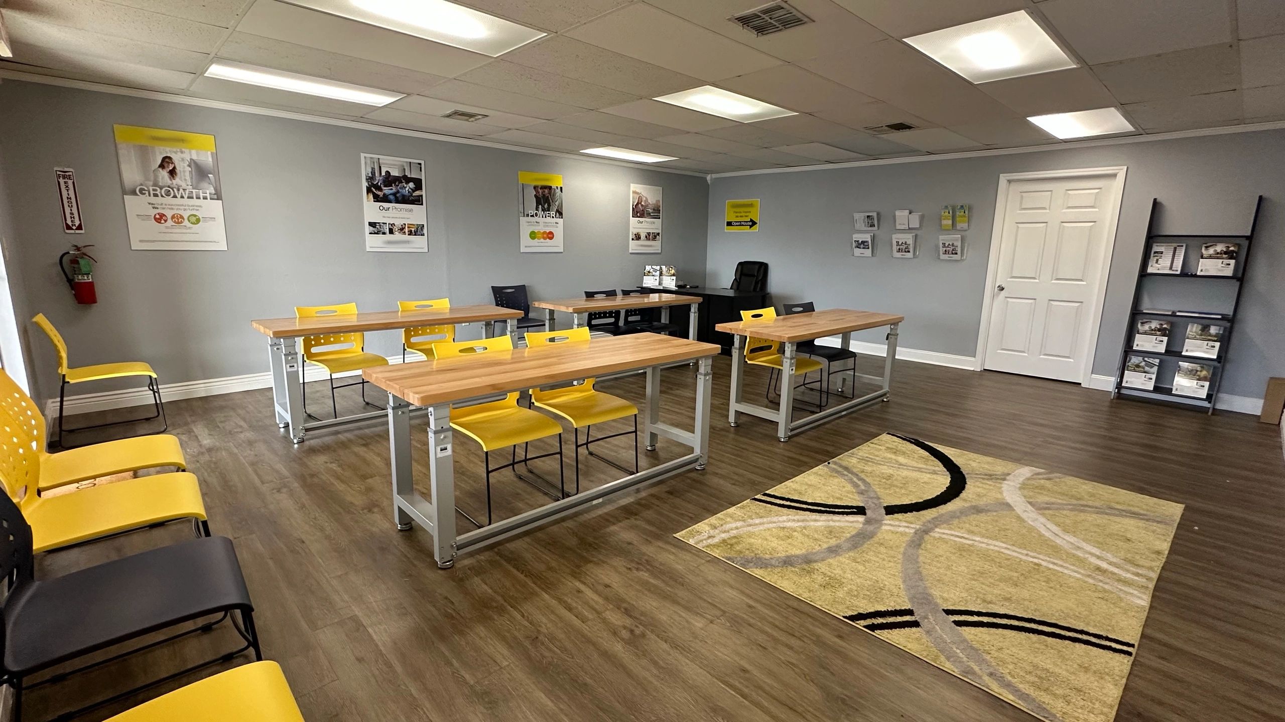 Classroom arranged neatly for an in-person real estate pre-licensing course in Spring Hill, Florida.