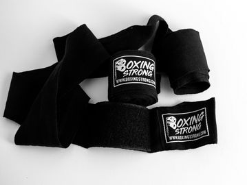 Semi-elastic, Mexican style, 180" boxing wraps. Wide velcro strap.