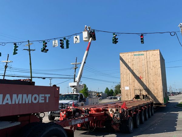 Bucket truck servicing traffic light.