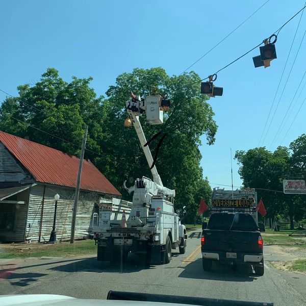 Bucket truck servicing traffic light.