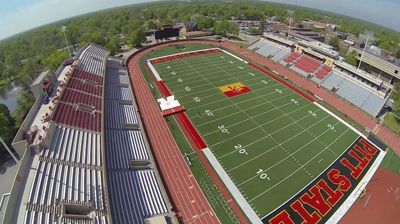 Aerial view of an empty football stadium with 'Gorillas' and 'Pitt State' markings.