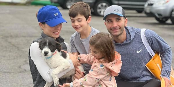 Family greets new adopted pet for the first time