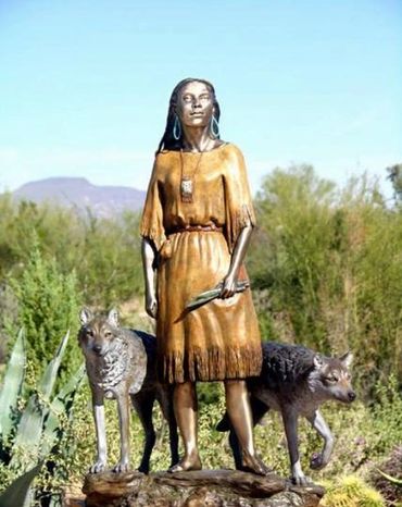Native American girl with two wolves