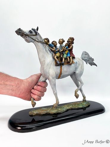 All Aboard bronze sculpture
14.5" 37cm H x 6" 15cm W 17.5" 44 cm L