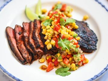 Flank steak with corn and avocado salsa