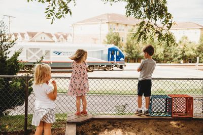 Children watching a train go by.
Photo by Alexandria Mooney Photography