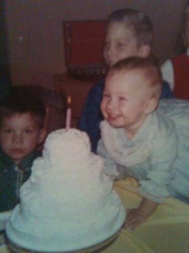 My first birthday flanked by my dear brothers!  Pure JOY!