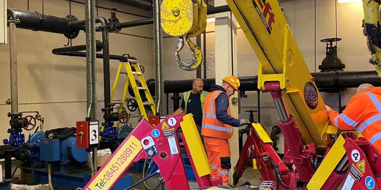 Specialist lifting equipment setup for NEC Birmingham pump set valve replacement.