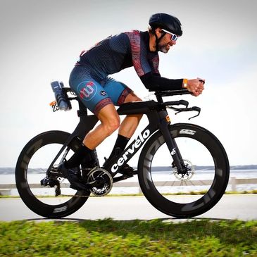 Andy cycling in Ultraman Florida 2023.