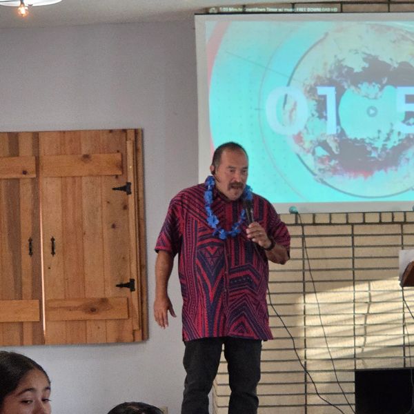 Kenny Yanagihara sharing the Word of God and offering faith-based.
