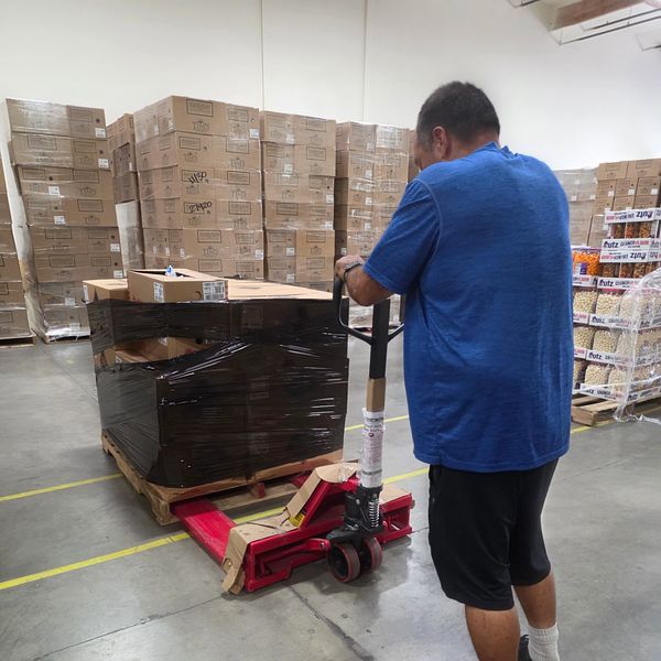 MKY Community Impact Outreach team picking up donated food and supplies for distribution to Long Bea
