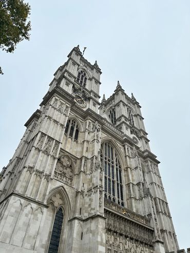 A grand Gothic-style cathedral with tall spires and intricate stonework.