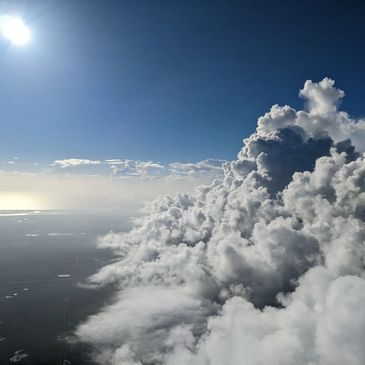 Soar in the clouds with flight training at our Flying Club!