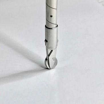 Flexible and expandable bone reamer